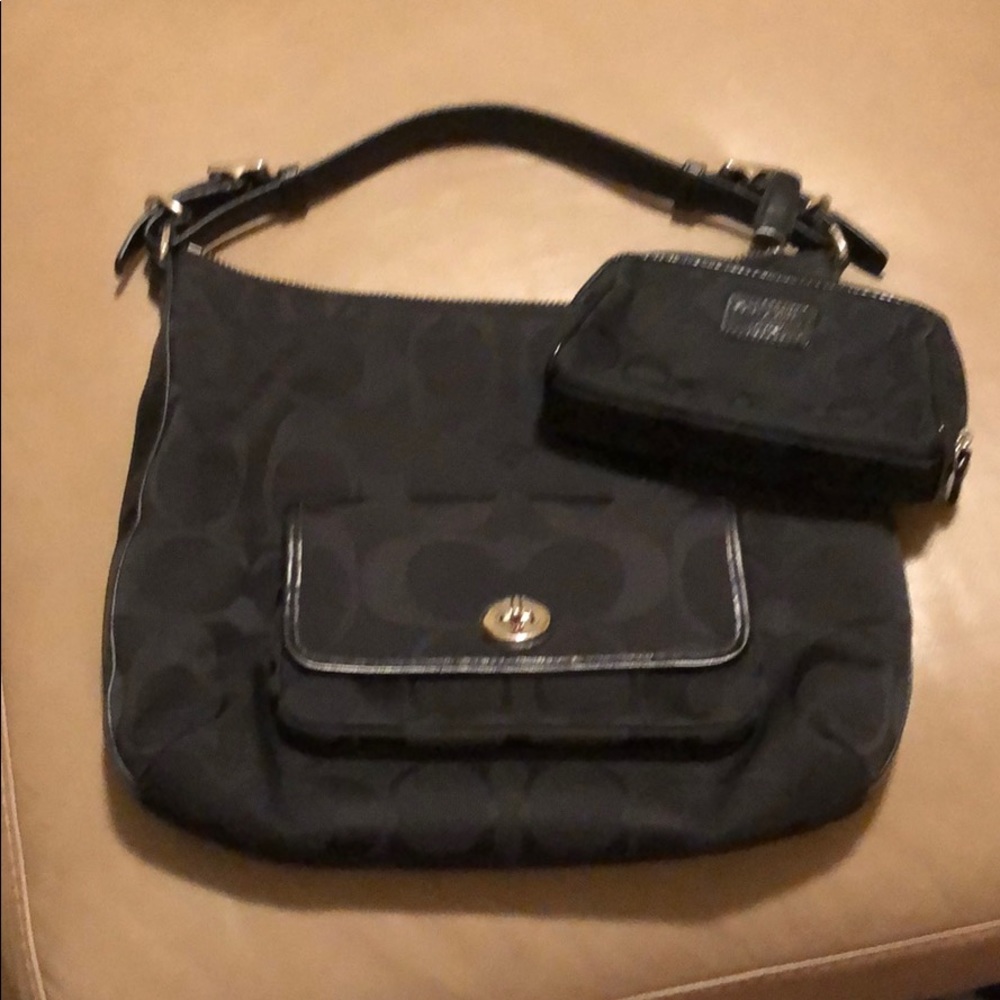Coach purse with makeup bag